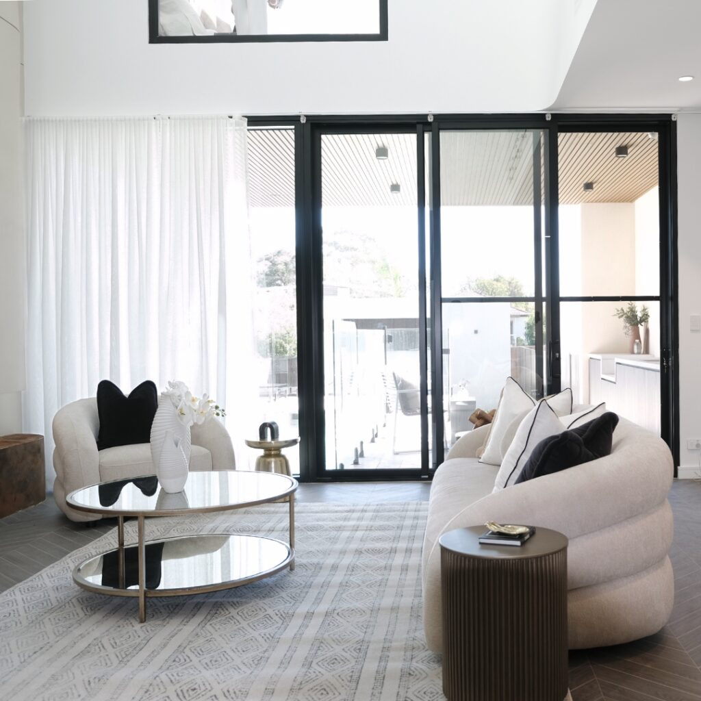 Comfortable Mira Sofa styled with cushions in a cozy living space