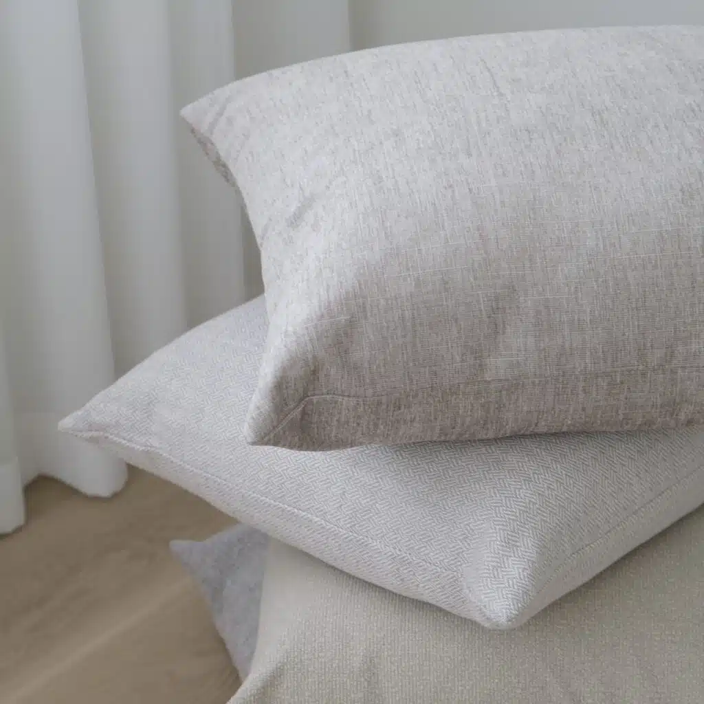 55cm x 55cm cushion with soft feather filling and removable cover
