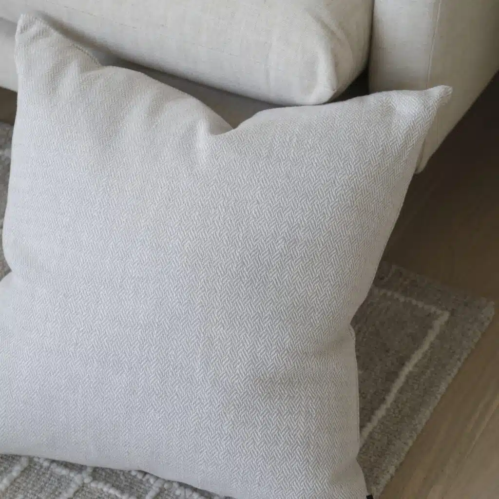 55cm x 55cm cushion with soft feather filling and removable cover