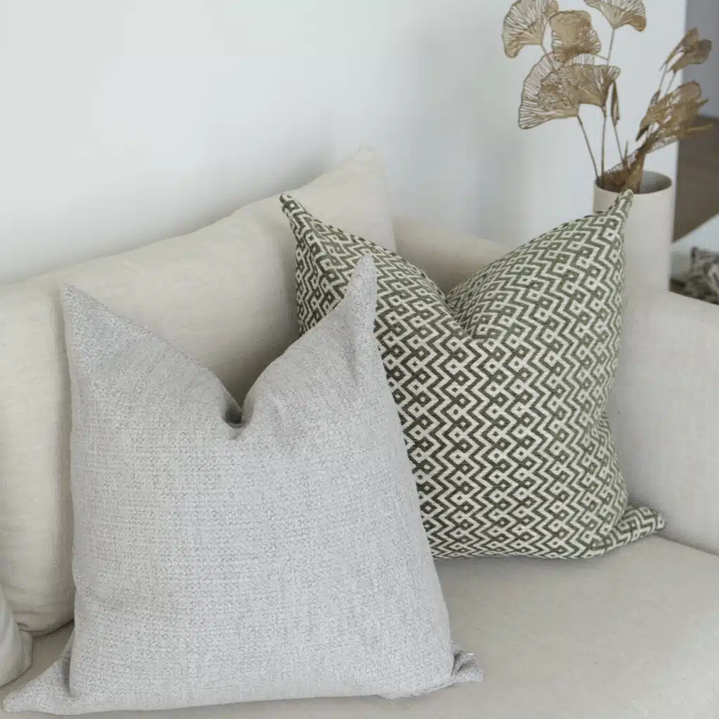 55cm x 55cm cushion with soft feather filling and removable cover