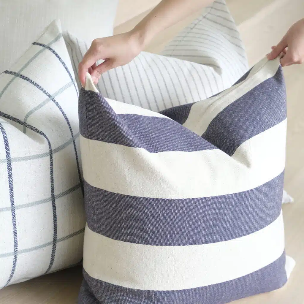 55cm x 55cm cushion with soft feather filling and removable cover