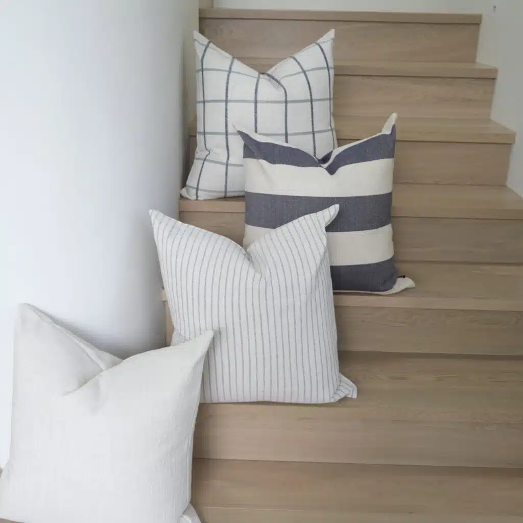 55cm cushion with soft feather filling and removable cover