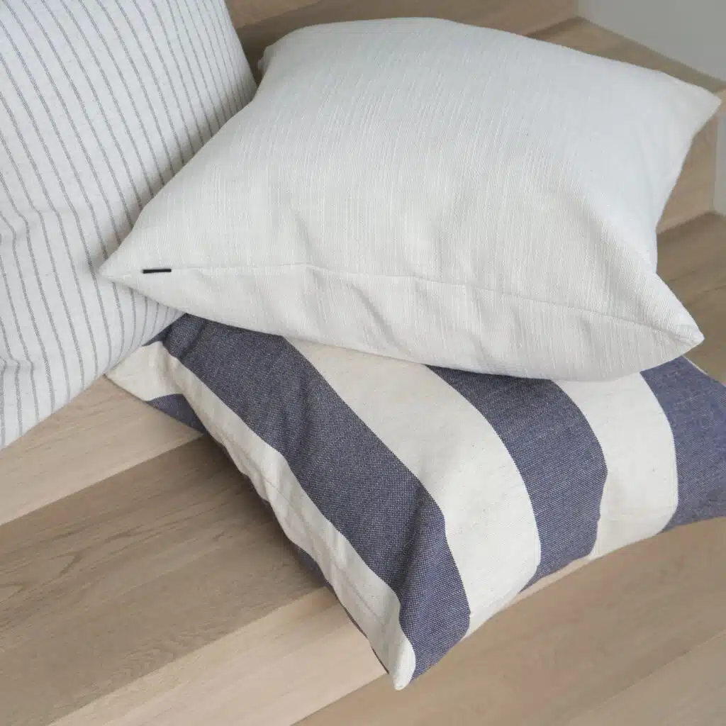 55cm cushion with soft feather filling and removable cover