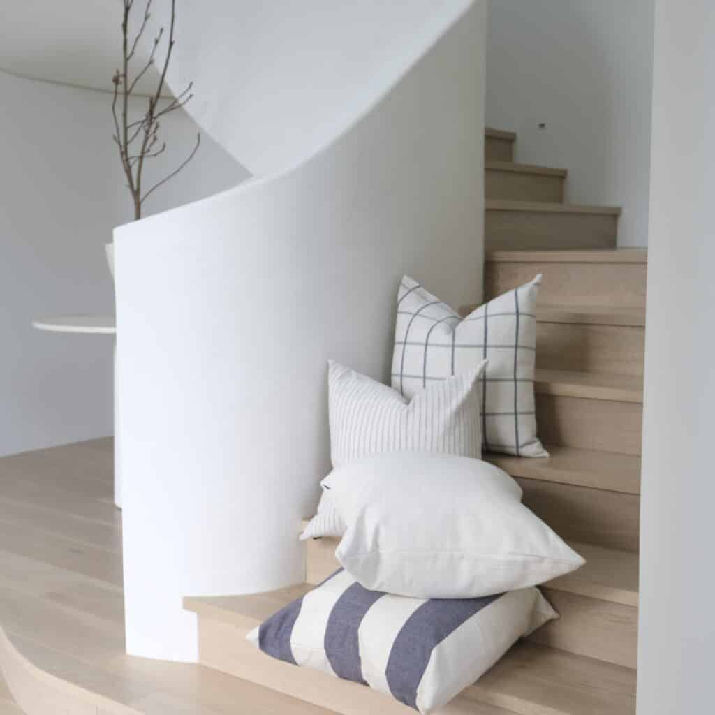 55cm cushion with soft feather filling and removable cover