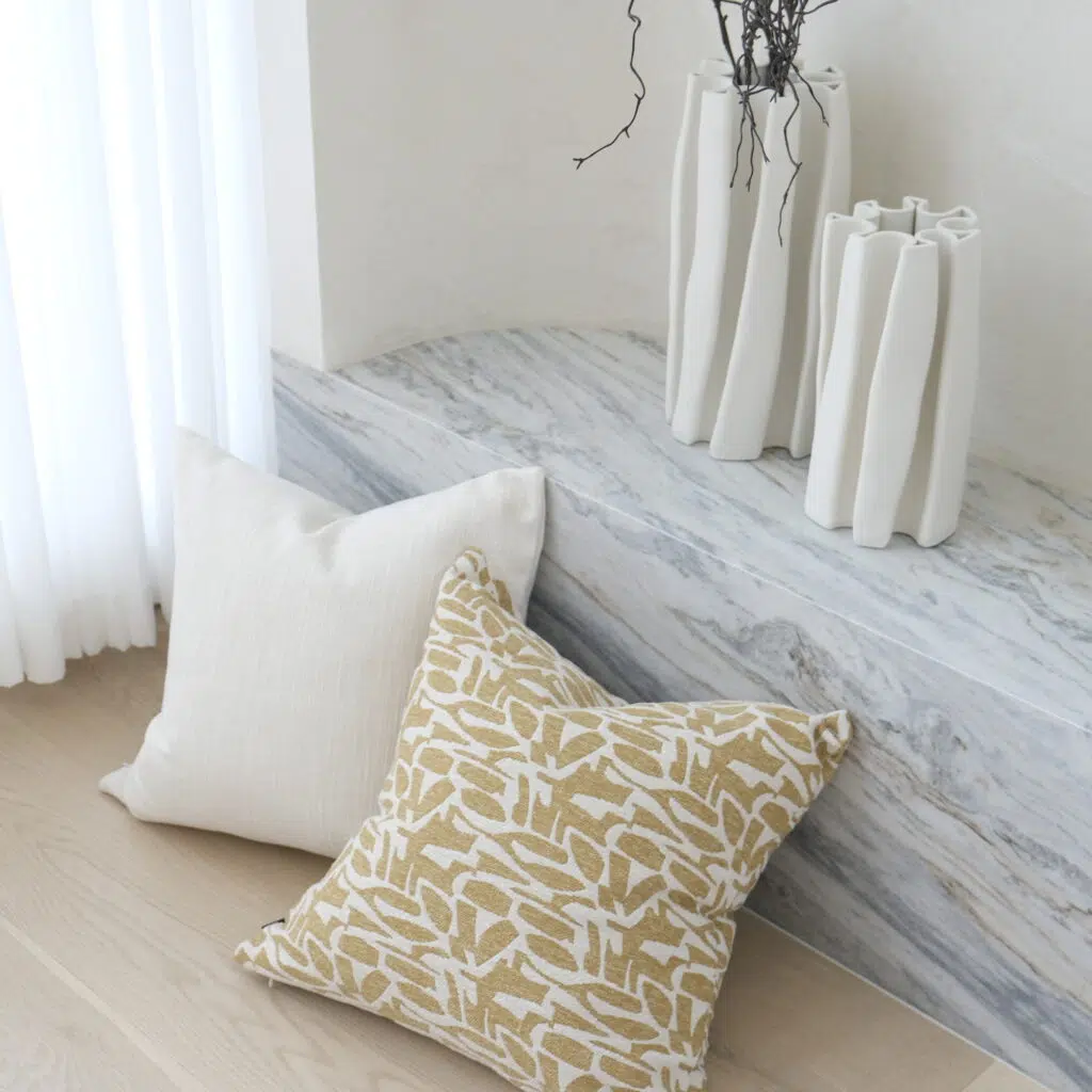 55cm cushion with soft feather filling and removable cover