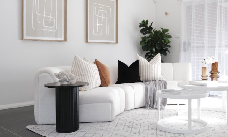 Round coffee table in a cozy living room setup