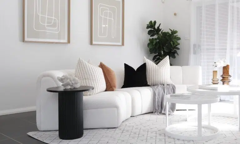 Round coffee table in a cozy living room setup