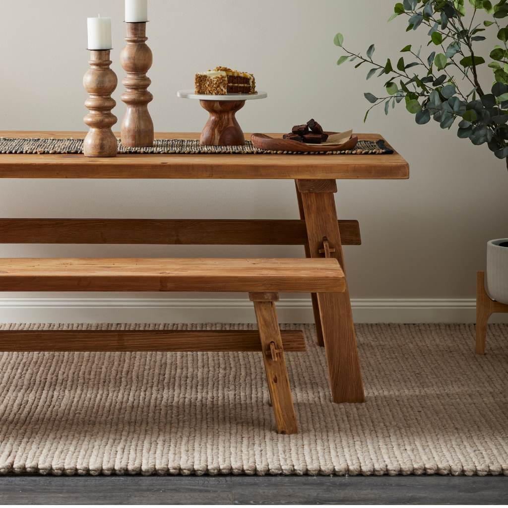 8-seater dining table, rustic, natural wood, handcrafted, reclaimed pine, versatile style, sturdy, sustainable, thick top, base stability, care tips, dining centerpiece