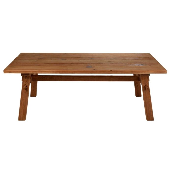 8-seater dining table, rustic natural wood, reclaimed pine, versatile design, sturdy base, natural grain, handcrafted, sustainable, warm centerpiece, practical elegance.