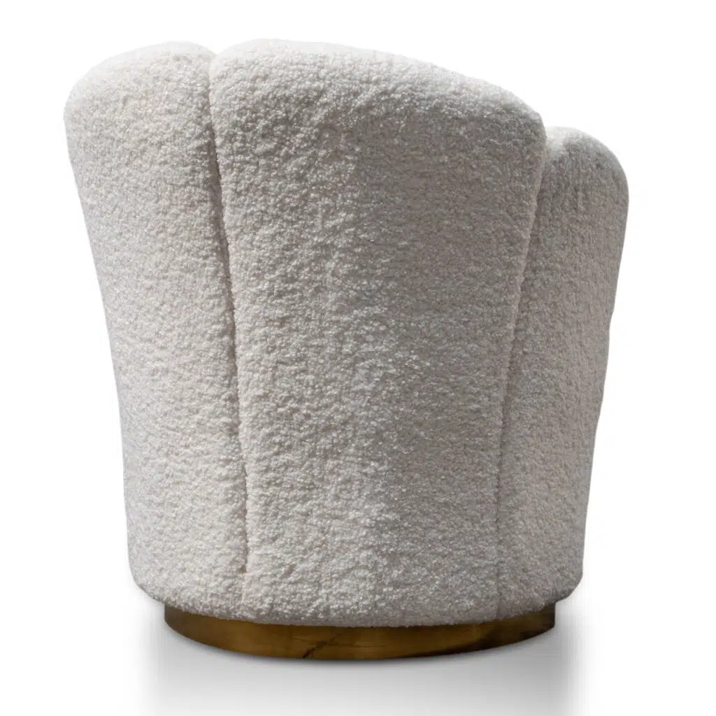 Elegant white lounge chair with brass base, modern design, plush upholstery, perfect for living spaces.