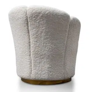 Elegant white lounge chair with brass base, modern design, plush upholstery, perfect for living spaces.