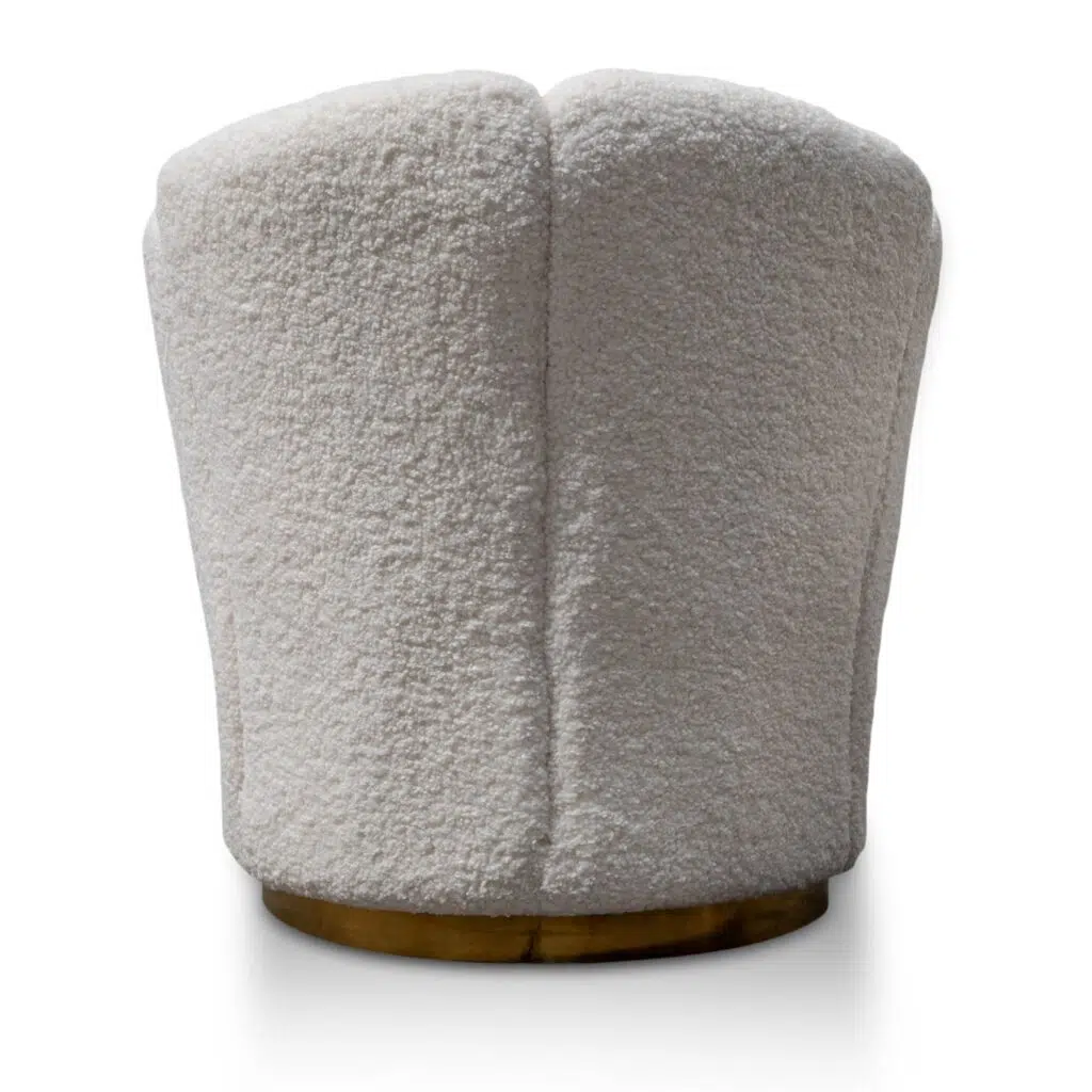 Elegant white lounge chair with brass base, modern design, plush seating, perfect for living spaces.