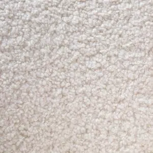 Elegant white lounge chair with brass base, modern design, plush upholstery, perfect for living spaces.