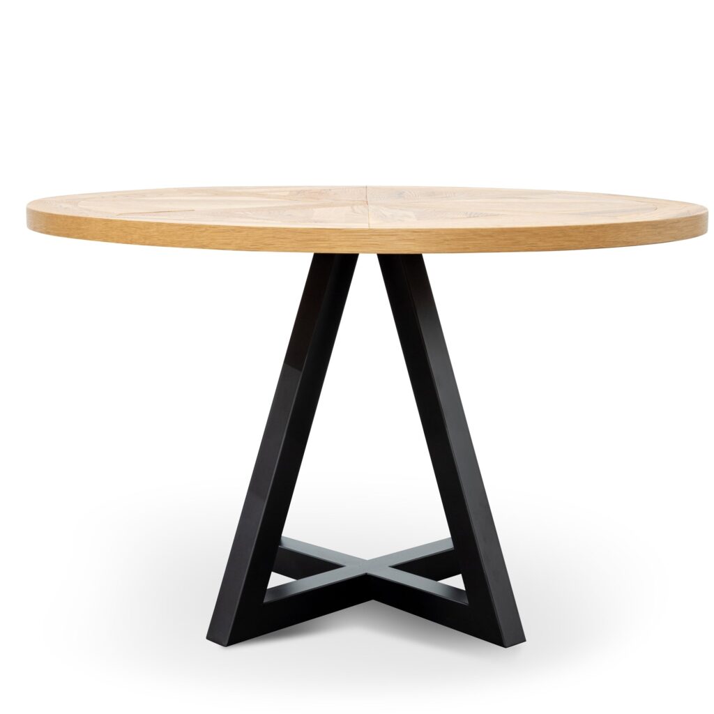 Round oak dining table with black metal legs