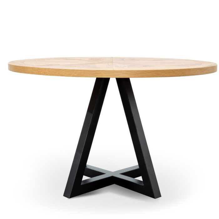 Round oak dining table with black metal legs