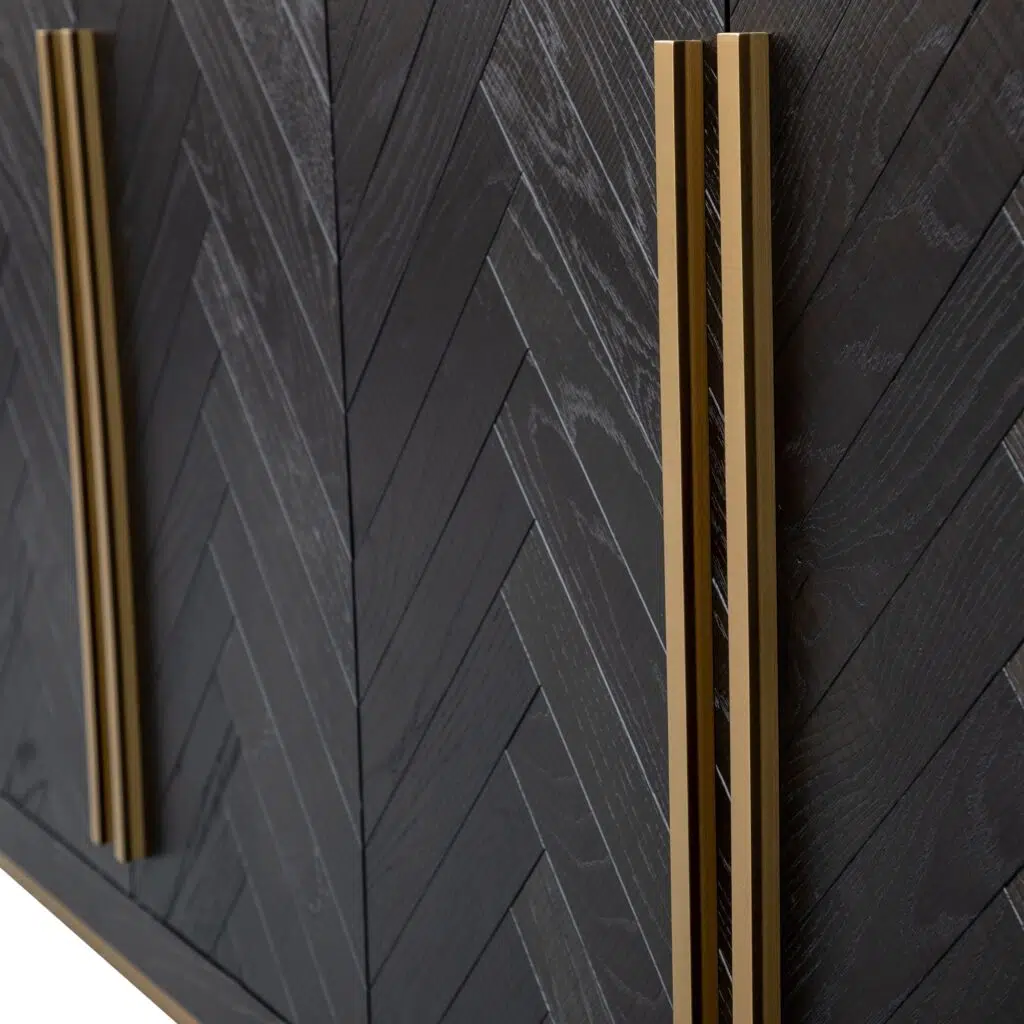 Elegant Inez Sideboard, black with brass accents, spacious storage, herringbone finish.