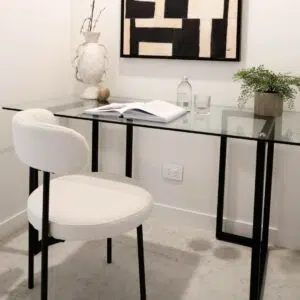 Arco boucle dining chair in soft cream fabric with modern design and sturdy metal frame