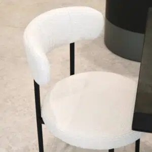 Arco boucle dining chair in soft cream fabric with modern design and sturdy metal frame