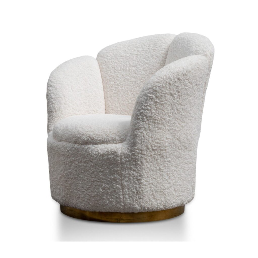 Elegant white lounge chair with brass base, modern design, plush upholstery, perfect for living spaces.