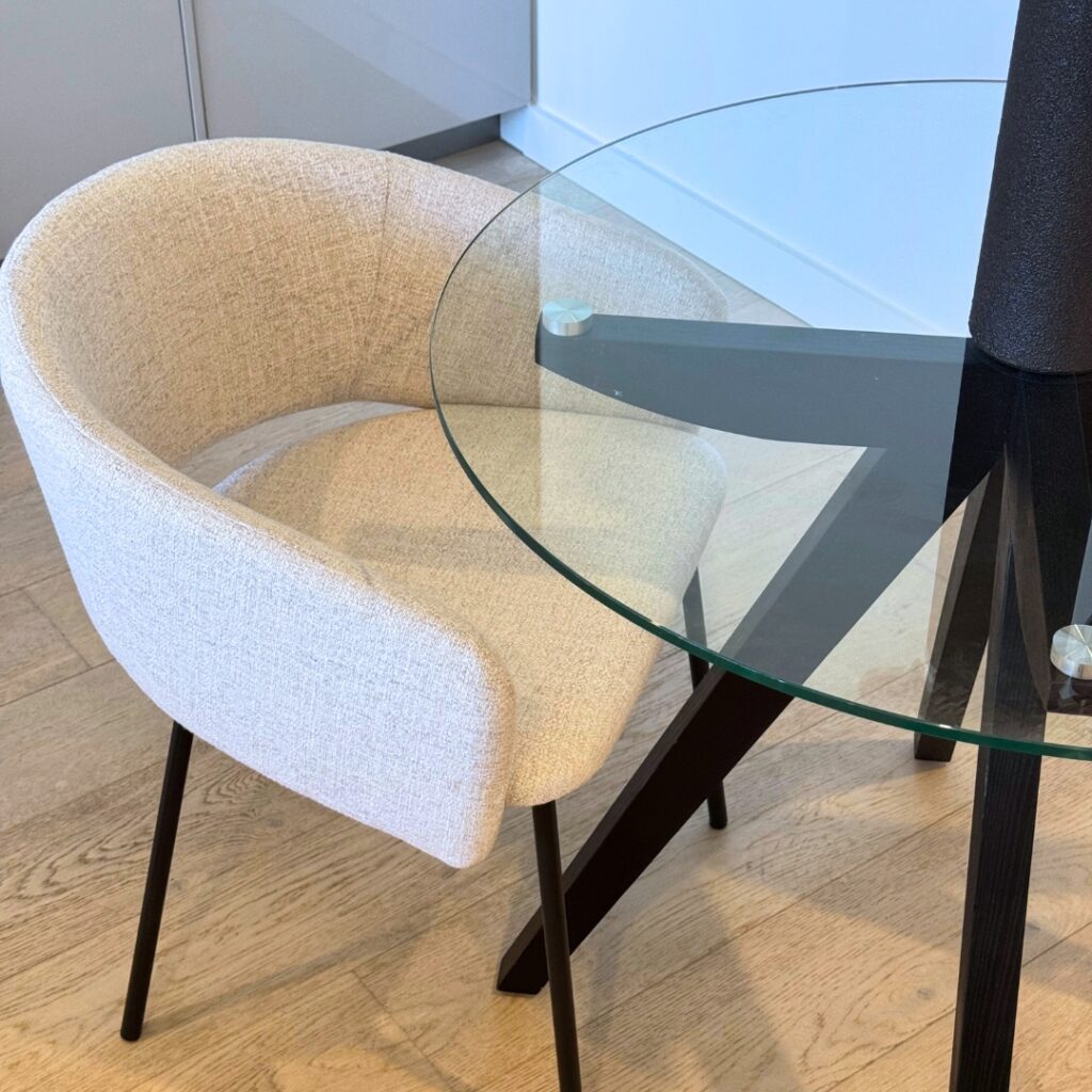 Sora dining chair in cream color with modern design and comfortable seating for various table styles