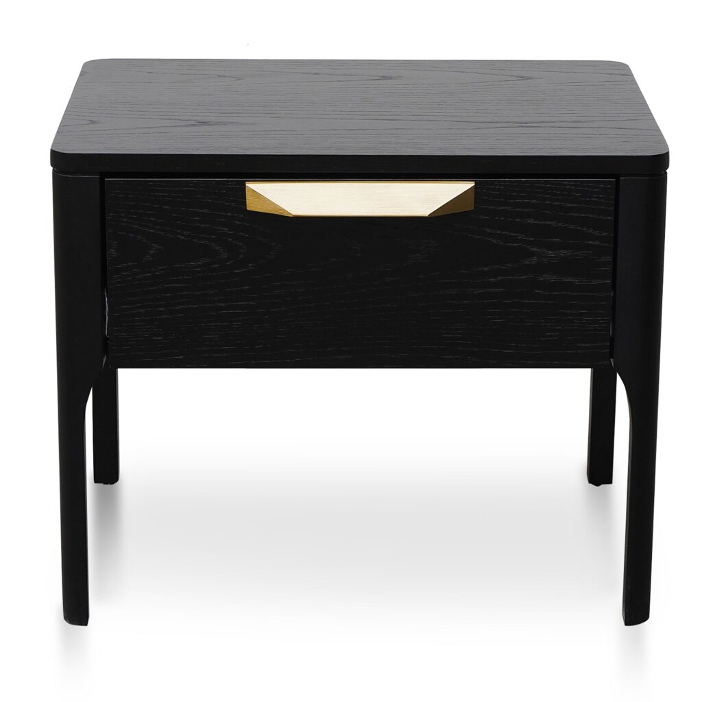Modern black veneer bedside table with brass handle, ideal for minimalist bedrooms.