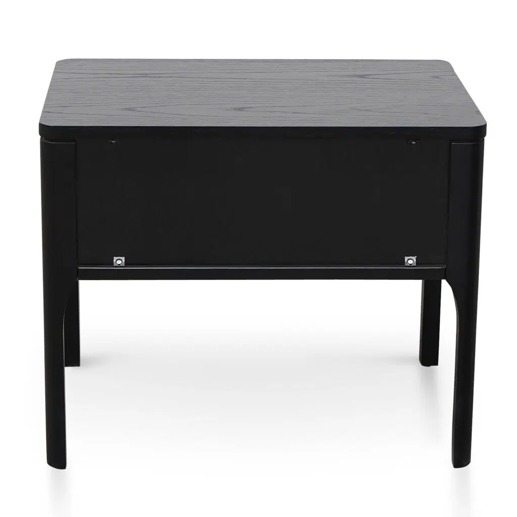 Modern black veneer bedside table with brass handle, ideal for minimalist bedrooms.