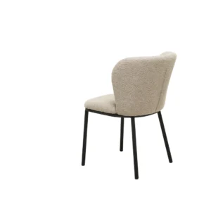 Modern latte boucle dining chairs with black metal frame and textured upholstery for versatile decor