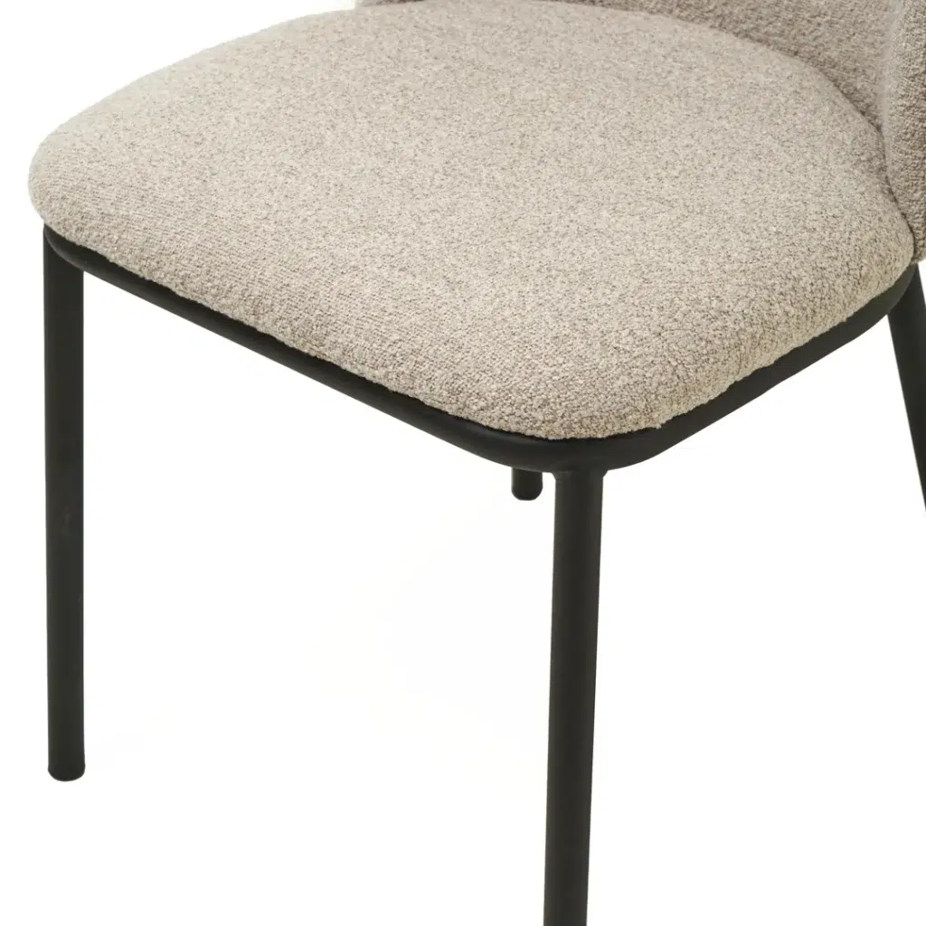 Modern latte boucle dining chairs with black metal frame and ergonomic design for stylish comfort