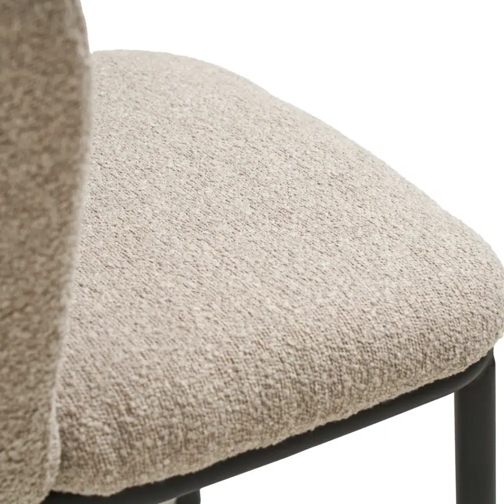 Modern latte boucle dining chairs with black metal frame for contemporary spaces