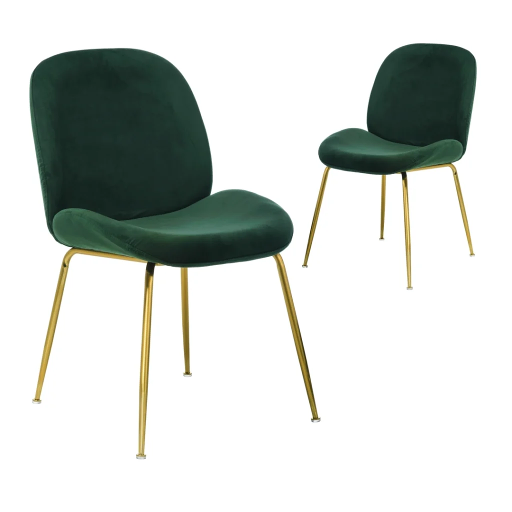 Elegant emerald dining chairs with golden legs and velvet upholstery for modern spaces