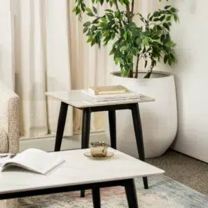 Bentley side table in snow white ceramic with black metal legs for modern spaces