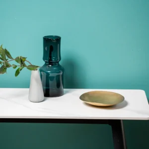 Bentley console table with snow white ceramic top and black metal legs for modern interiors