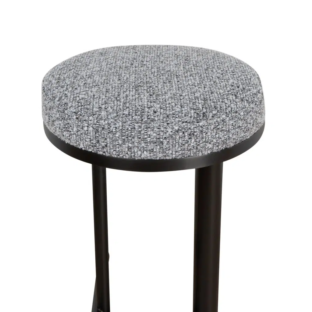 Soren 68cm black bar stool with graphite grey boucle fabric and steel frame. Sturdy ergonomic design for kitchens or cafes.