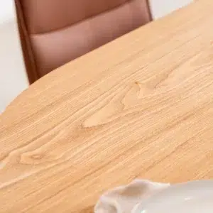 Boyd natural dining table with ash veneer and matte finish for modern homes