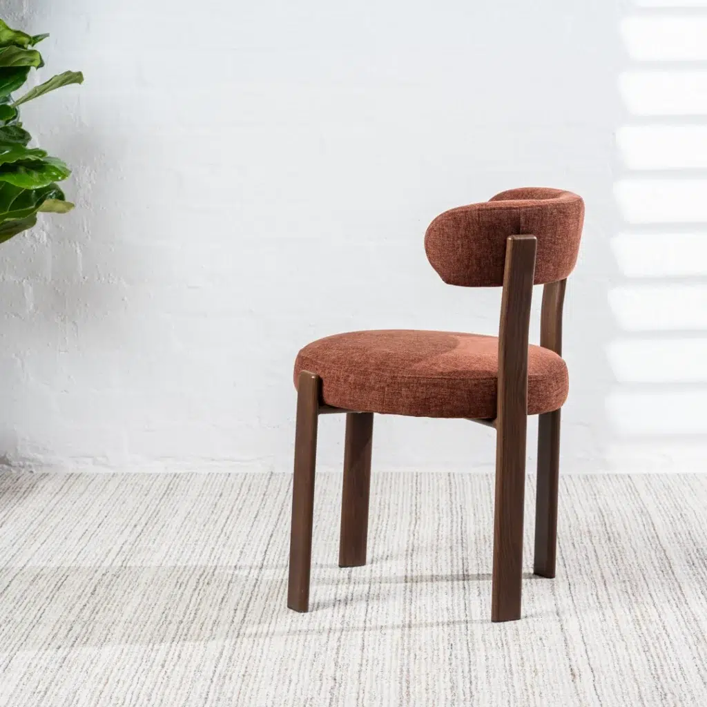 Carmo dining chairs in rust color set of 2 with boucle fabric and walnut legs for modern interiors