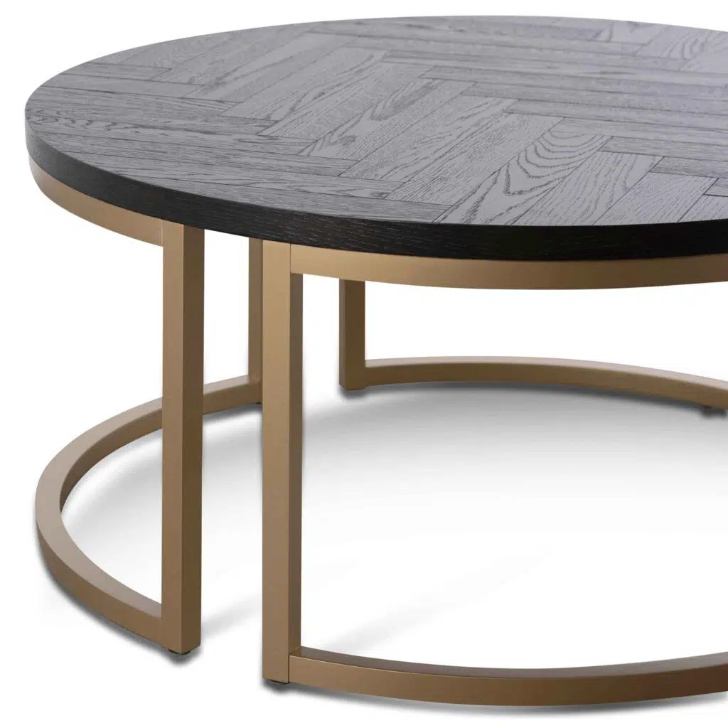 Cyrus round coffee table with peppercorn herringbone top and brass base for modern living rooms