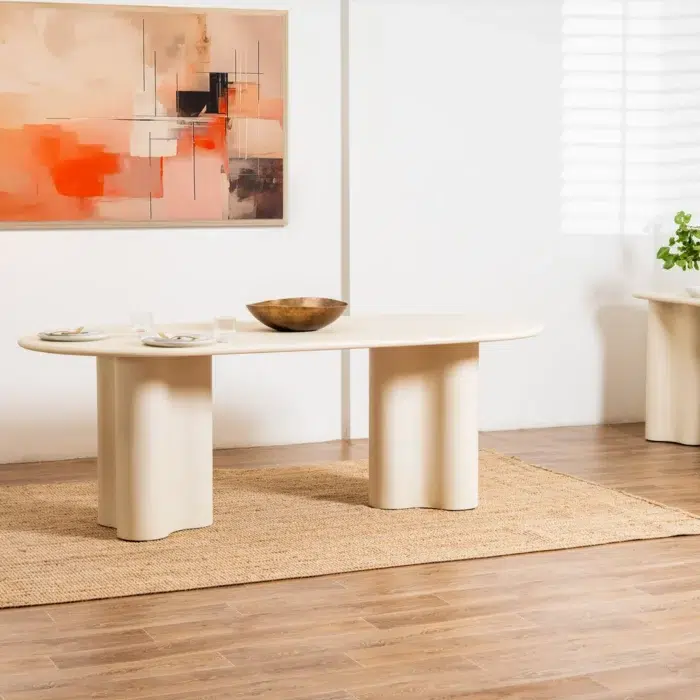 Ava Coastal Dining Table with pebble texture micro-cement finish for 8-person open-plan dining
