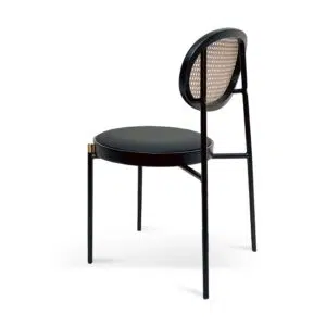 Violet fabric natural rattan dining chair with black frame and gold accents for modern elegance