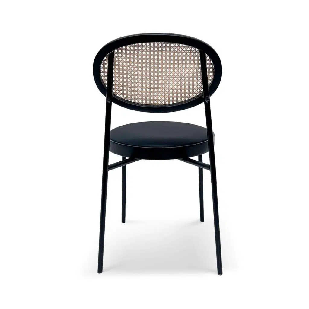 Violet fabric natural rattan dining chair with black frame and gold accents for modern elegance