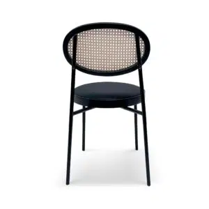 Violet fabric natural rattan dining chair with black frame and gold accents for modern elegance