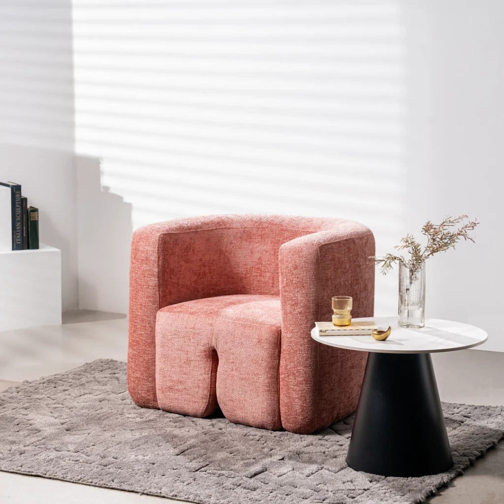 Donatella Occasional Chair in blush with modern curved design for living room or home office