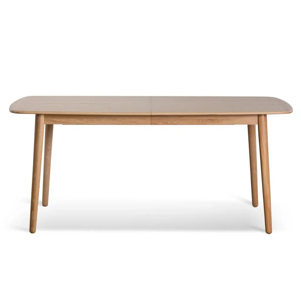 Extendable dining table in natural wood with tapered legs for modern interiors