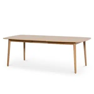 Natural wood poppy extendable dining table with tapered base and soft edges for modern homes