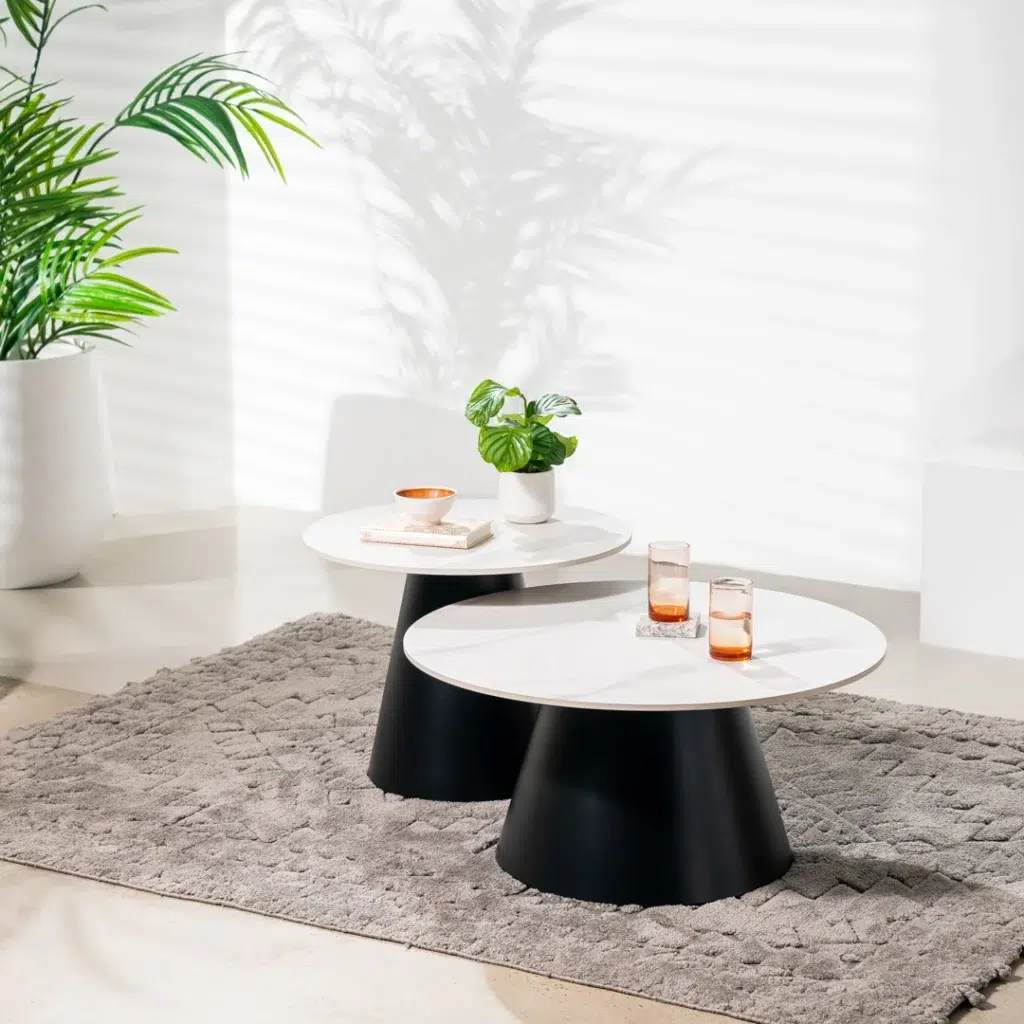 Snow white ceramic coffee table set with black metal frame, modern minimalist design for living room