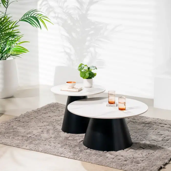 Snow white ceramic coffee table set with black metal frame, modern minimalist design for living room