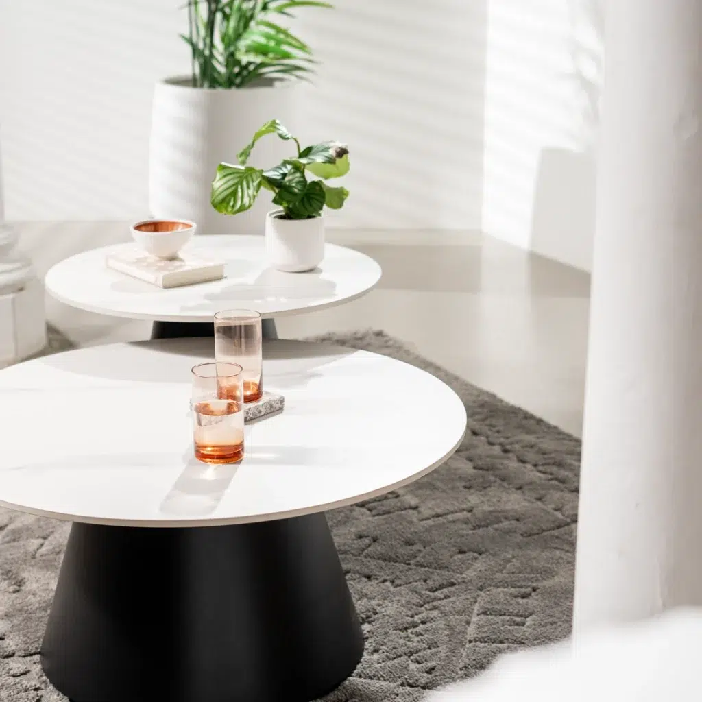 Snow white ceramic coffee table set with black metal frame, modern modular design for living room