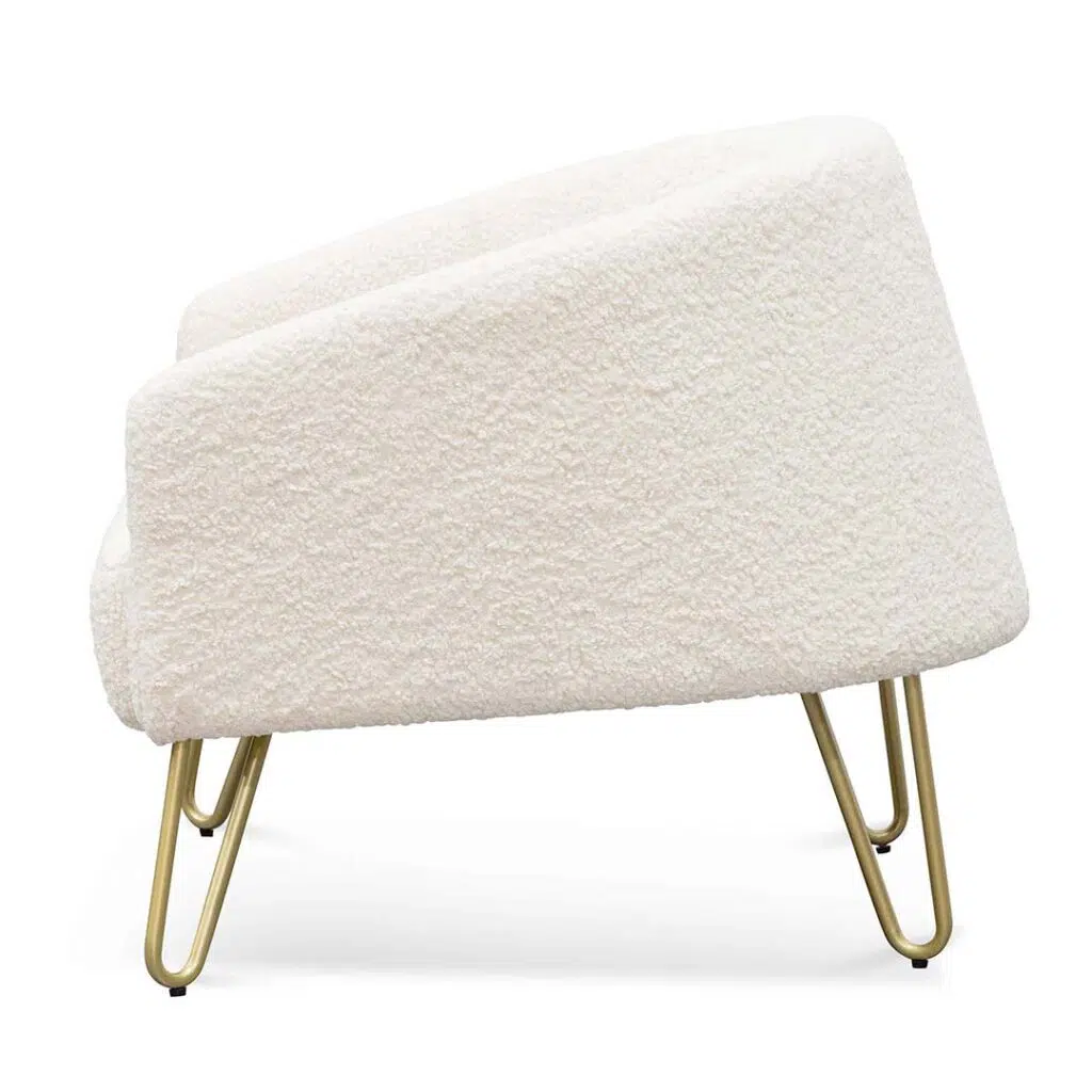 Ivory white synthetic wool armchair with golden hairpin legs for modern spaces