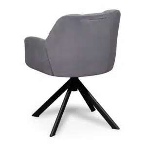 Dark grey velvet visitor chair with black legs and tufted back for modern elegance