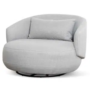 Maya swivel armchair in light texture grey elevating modern interiors with comfort and style