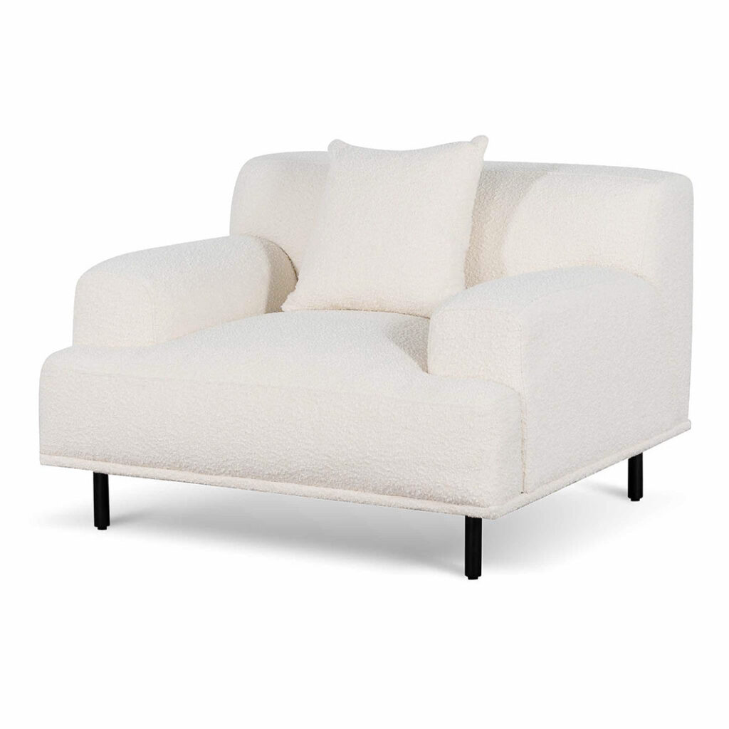 Ivory white boucle armchair with black legs for modern living spaces